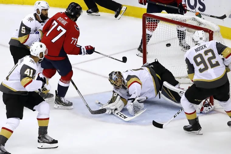 Washington forward T.J. Oshie (77) beats Vegas goaltender Marc-Andre Fleury to give the Capitals a 1-0 first-period lead Monday. 