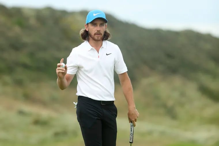 England's Tommy Fleetwood reacts after he saves par on the 15th green during Saturday's third round of the Open Championships at Royal Portrush in Northern Ireland.