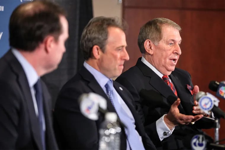 “I think that any time you have an opportunity to enhance your organization and you bring people in to accomplish that, you need to consider it big time. You really do,” said Jerry Colangelo, the team’s chairman of basketball operations (right), seen here alongside Sixers owner Josh Harris (center) and GM Sam Hinkie (left).
