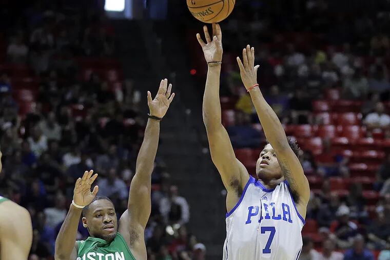 Philadelphia 76ers guard Markelle Fultz (7) shoots as Boston Celtics guard Demetrius Jackson (9) defends during the first half of an NBA summer league basketball game Monday, July 3, 2017, in Salt Lake City.