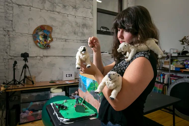 Klementina Budnik, a visual artist, at her studio at Firehouse Arts on Germantown Ave in Germantown section of Philadelphia. She teaches animation to refugee and immigrant children in the Philadelphia area. She's pictured with stop-motion polar bear puppets.
