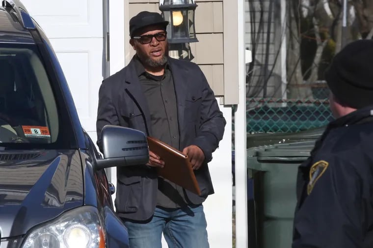 Atlantic City Mayor Frank Gilliam leaves his home after members of the FBI and Internal Revenue Service searched his home and left with boxes and other items, Monday, Dec. 3, 2018.
