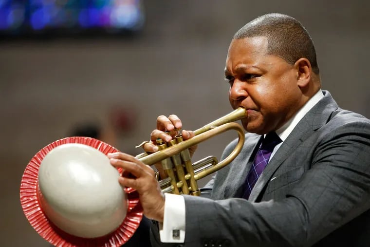 Musician Wynton Marsalis performs during a memorial service for actress Ruby Dee at The Riverside Church, Saturday, Sept. 20, 2014 in New York. (AP Photo/Jason DeCrow)