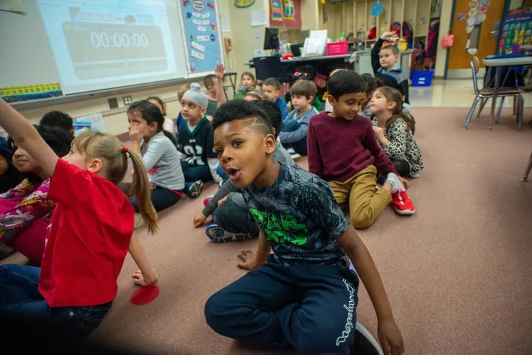 Noah Henry answers a question during his full-day kindergarten class at Walton Farm Elementary in Lansdale. Gov. Tom Wolf wants to require that all school districts in Pennsylvania offer free, full-day kindergarten.