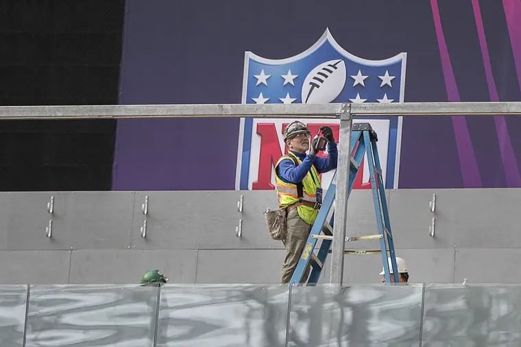Work went on at U.S. Bank Stadium’s field as NFL Senior Director of Events Eric Finkelstein and NFL Field Director Ed Mangan spoke Tuesday about preparations for Super Bowl LII.