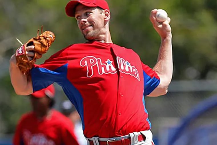 Cliff Lee allowed two runs in six innings pitched against the Blue Jays. (Kathy Willens/AP)