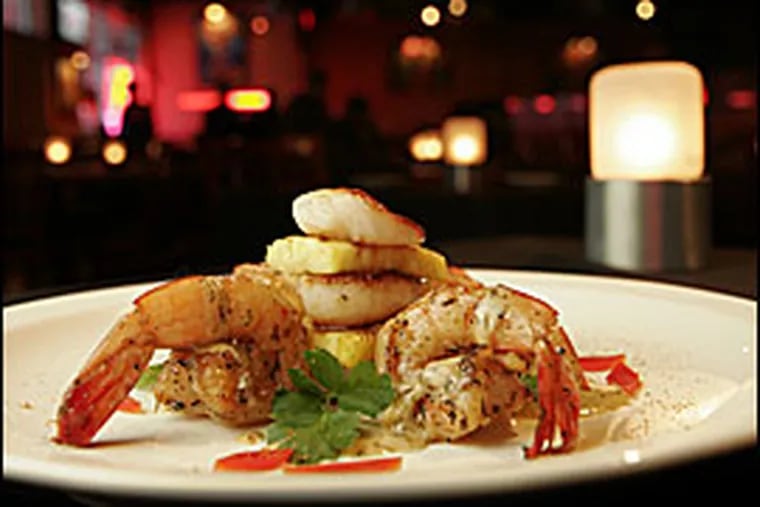 The jerk-seasoned starter of shrimp, scallops and warm chips of grilled pineapple was tasty and showed the originality that chef Don Wharton is capable of.