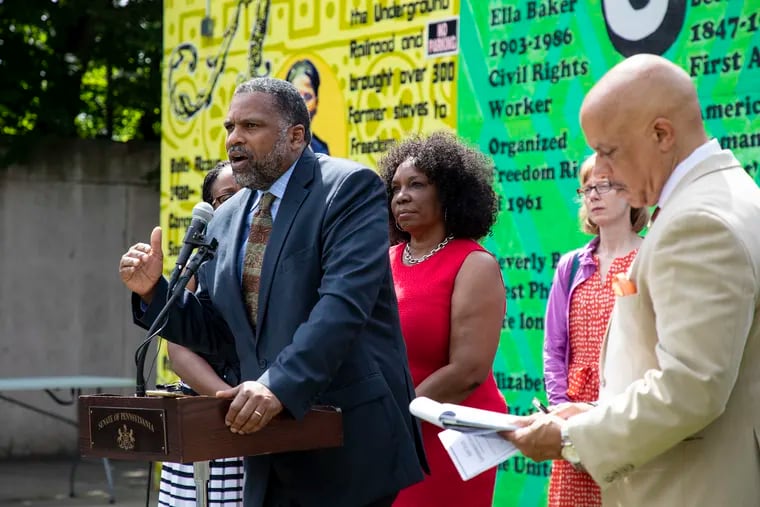 Jerome Shabazz, Overbrook Environmental Educational Center, at the podium, along with fellow pediatricians and State Senator Vincent Hughes, right, speaks in support in legislations aim to tackling Philadelphia's toxic lead problem and ways the community can bring awareness at the Philadelphia Department of Public Health on Friday morning June 7, 2019.