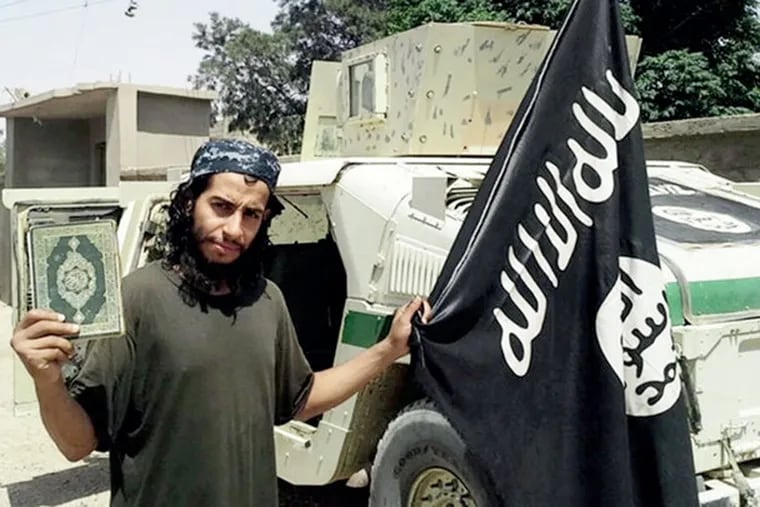 Belgian national Abdelhamid Abaaoud, alleged mastermind of the Paris attacks, as he appeared in an ISIS magazine.