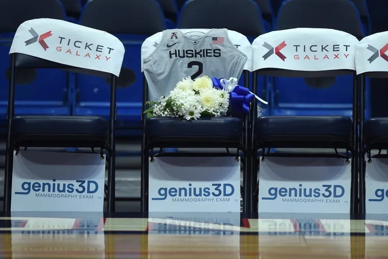 A spot on the UConn bench honored Gianna Bryant during Tuesday's exhibition game vs. Team USA.