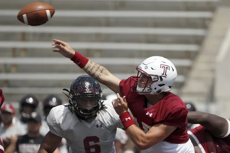 Temple’s Anthony Russo throws as the Owls scrimmage at Franklin Field on Saturday.