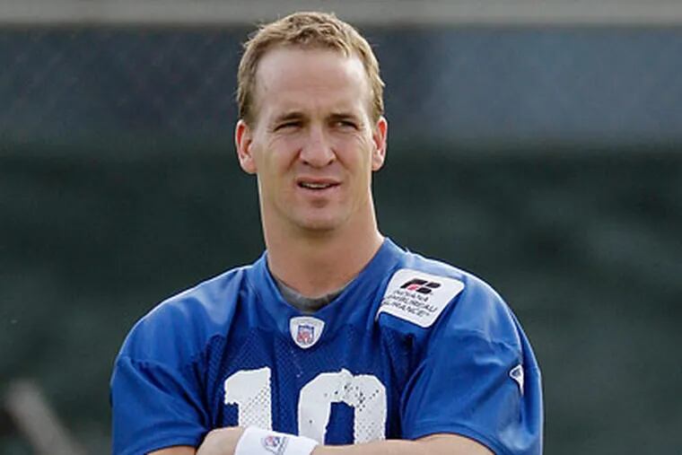 Indianapolis Colts quaterback Peyton Manning waits for practice to begin on Thursday in Miami. (AP Photo/Eric Gay)
