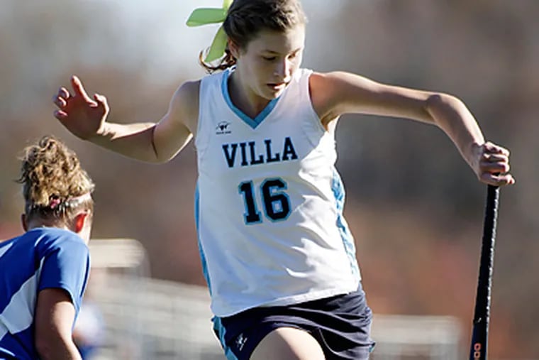 Villa Maria Academy's Maura Zarkoski tries to maintain control of the ball during a game against Oley Valley. (Elizabeth Robertson / Staff Photographer)