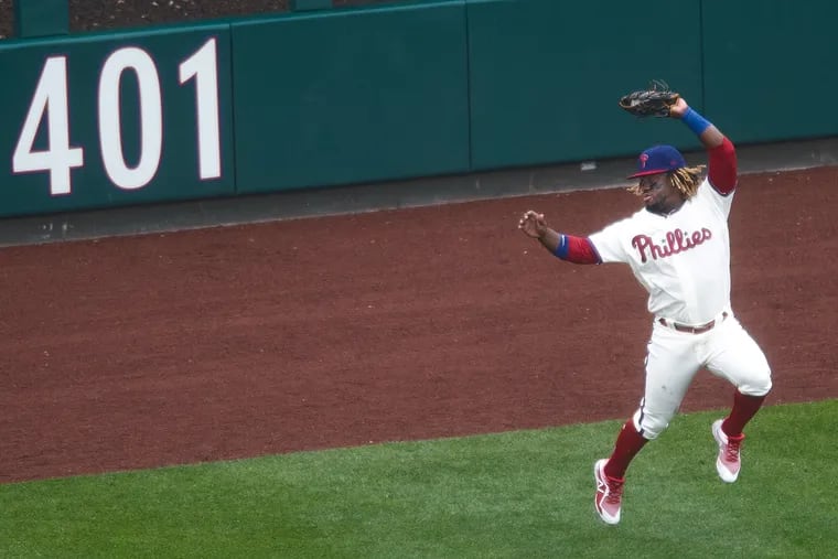 Phillies, Odubel Herrera leaps for a catch in the 6th inning against the Washington Nationals at Citizens Bank Park in Philadelphia, Pa. Sunday, May 5, 2019.