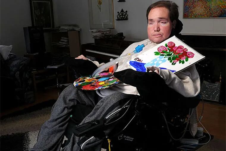 Eyal Sherman, disabled by illness at age 4, is now a college grad and artist. Rabbi Charles Sherman, Eyal's father, wrote &quot;The Broken and the Whole: Discovering Joy After Heartbreak&quot; (Simon & Schuster), about the family's adversity. (Michael Greenlar/Syracuse Post Standard)