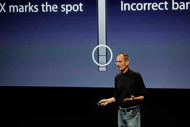Apple CEO Steve Jobs addresses the iPhone 4's antenna problems Friday in Cupertino, Calif. (Associated Press photo)