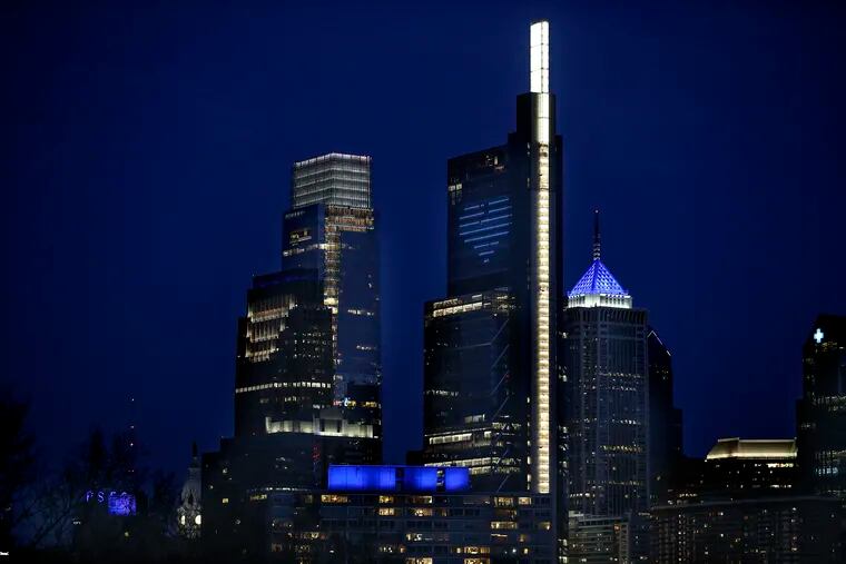 The Philadelphia skyline from the South Street Bridge as the city lights up blue to honor healthcare workers April 7, 2020.