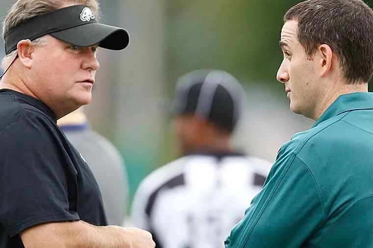 Chip Kelly (left) and Howie Roseman, then the general manager,at training camp in 2013. (David Maialetti/Staff Photographer)