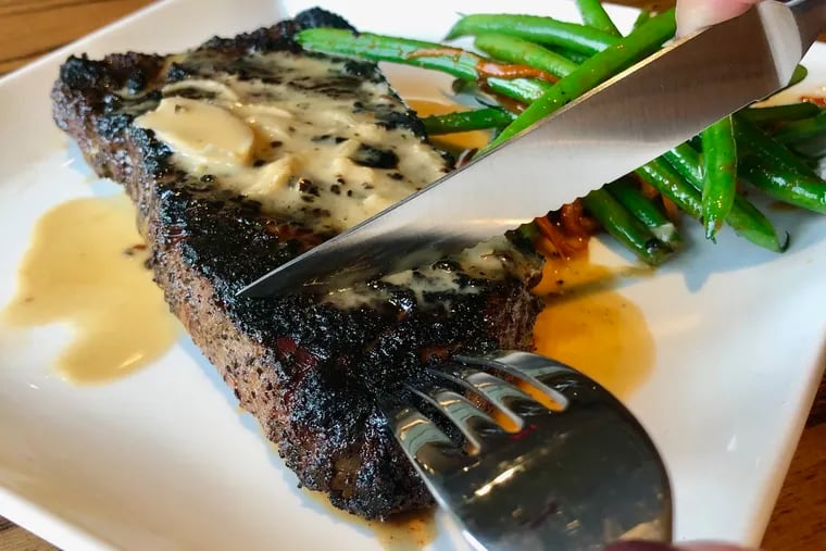 Kona-crusted, 12-ounce strip steak at ChopHouse Grille.