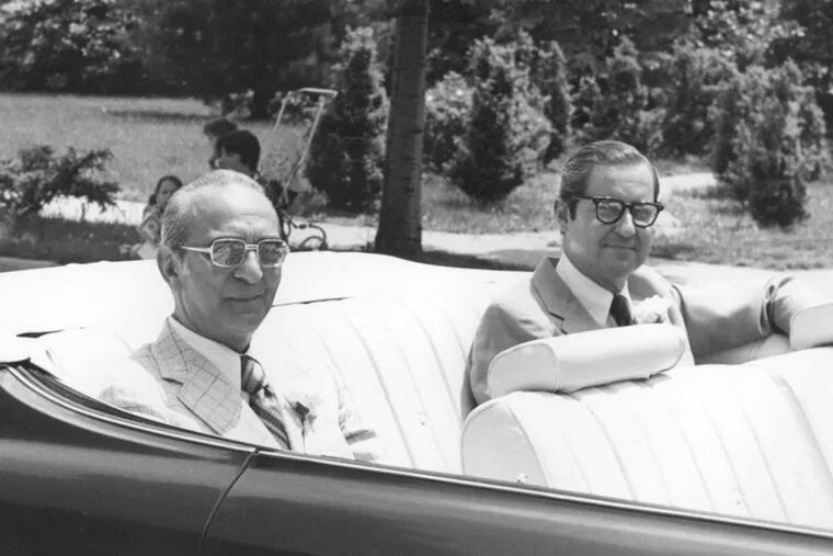 In a 1974 photo, G. Burton German Jr., right, and Walter Kurkian ride in a convertible with the top down during Merchantville's Centennial Parade. Mr. German was the South Jersey borough's mayor at the time, and he was named Centennial Man of the Year.