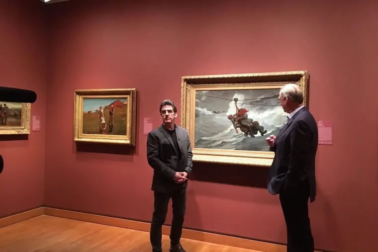 Philadelphia Museum of Art director Timothy Rub (right) and Chamber Orchestra of Philadelphia music director Dirk Brosse pause at Winslow Homer’s The Life Line, which inspired one movement in Brosse’s new Pictures at an Exhibition.