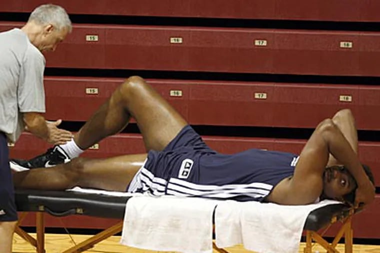 On October 1, the Sixers announced that Andrew Bynum will sit out for three weeks. (Yong Kim/Staff Photographer)