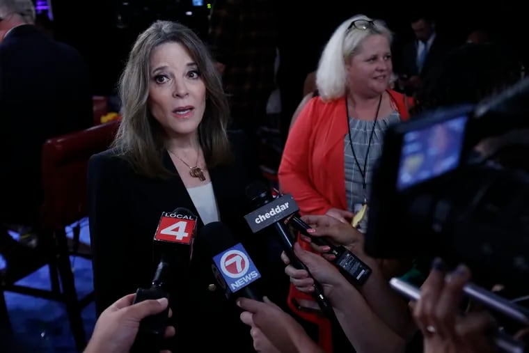 Marianne Williamson talks to reporters after the first of two Democratic presidential primary debates hosted by CNN Tuesday, July 30, 2019, in the Fox Theatre in Detroit.