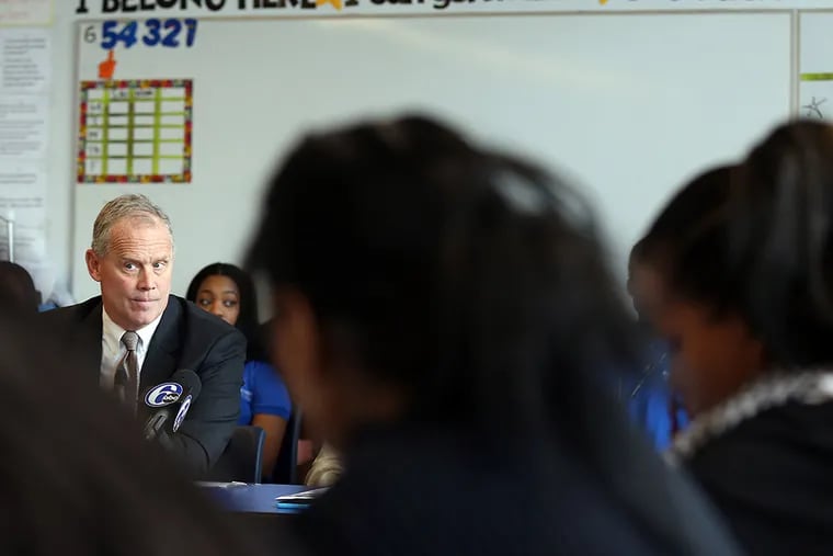 Pa. House Speaker Mike Turzai, left,  holds a roundtable discussion with charter school parents and calls on the SRC to approve some of the applications for 40 new charter schools in Philadelphia on January 22, 2015.  ( DAVID MAIALETTI / Staff Photographer )