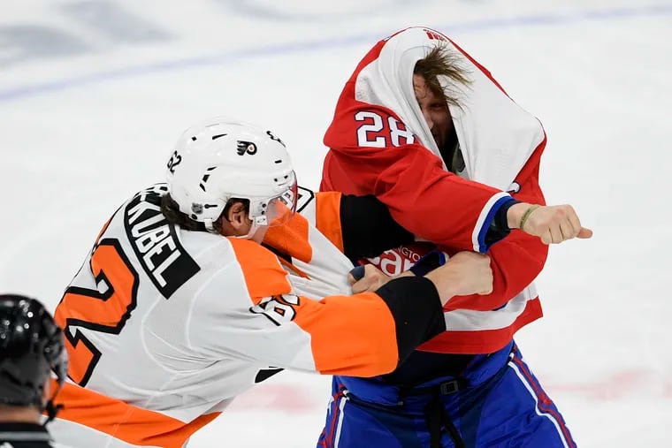 This little scrap with Brendan Leipsic helped Nicolas Aube-Kubel (left) get his first Gordie Howe hat trick as the visiting Flyers lumped the Capitals, 7-2, on Saturday night.