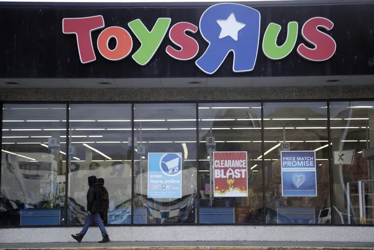 A person walking near the entrance to a Toys R Us store, in Wayne, N.J. Toys R Us’s management has told its employees that it will sell or close all of its U.S. stores.