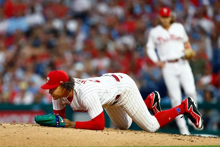 PHILADELPHIA, PENNSYLVANIA - AUGUST 22:  Taijuan Walker #99 of the Philadelphia Phillies hits the mound after being knocked down by a line drive single by Patrick Bailey #14 of the San Francisco Giants during the fourth inning of a game at Citizens Bank Park on August 22, 2023 in Philadelphia, Pennsylvania. (Photo by Rich Schultz/Getty Images)