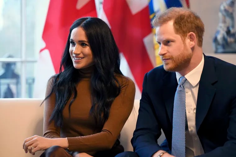 Prince Harry (right) and his wife Meghan (left) are 'stepping back' as senior UK royals.