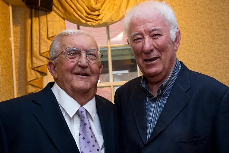 Mr. Quinlan (left) met with Nobel Prize-winning poet Seamus Heaney in 2011 in New York.