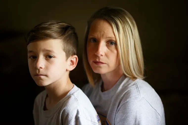 Gage Meche was 7 when he was accidentally shot in the stomach last year with a pistol brought to school by a fellow first-grader. His mother, Kirsta LeBleu, says he is still in near constant pain.