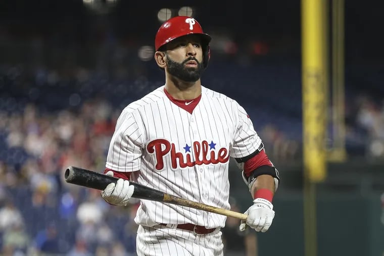 New Phillie Jose Bautista walks off after striking out during the seventh inning of Tuesday's loss to the Nationals.