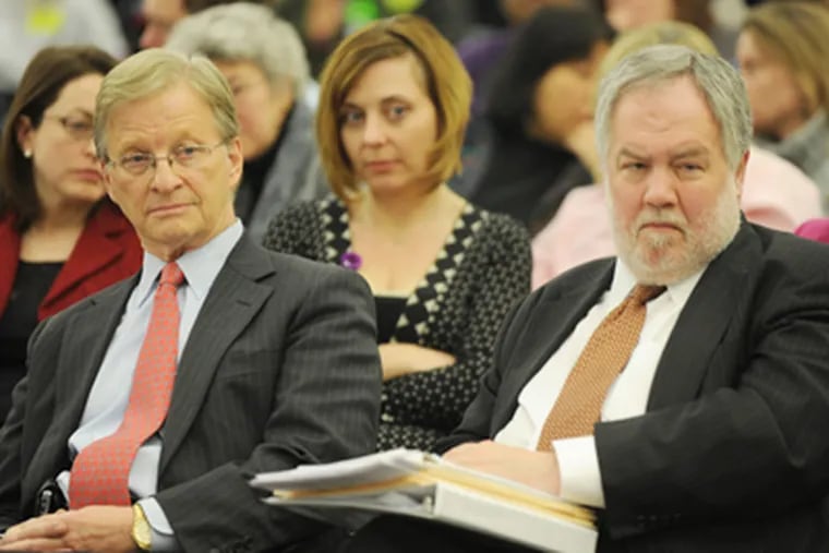 Thomas Knudsen (left) and Michael Masch at an SRC meeting. Knudsen saved PGW but has not worked in education. (Sarah J. Glover / Staff Photographer)