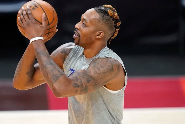 Philadelphia 76ers center Dwight Howard warmed up before Monday's game against the Utah Jazz, hours after hearing news of his grandmother's passing.