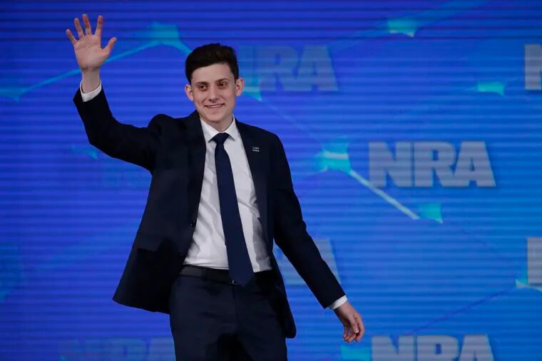 FILE - In this April 26, 2019, file photo, Kyle Kashuv, a survivor of the Marjory Stoneman Douglas High School shooting in Parkland, Fla., speaks at the National Rifle Association Institute for Legislative Action Leadership Forum in Indianapolis. On Monday, June 17, 2019, Kashuv said that Harvard University revoked his acceptance over racist comments he made online and in text messages about two years ago.