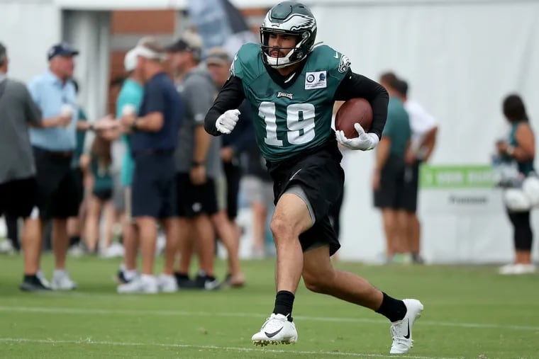 Rookie wide receiver J.J. Arcega-Whiteside runs after catching a ball during Eagles training camp.