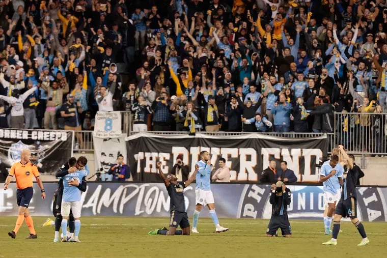 Union players and fans celebrate after winning the MLS Eastern Conference final against NYCFC, 3-1.