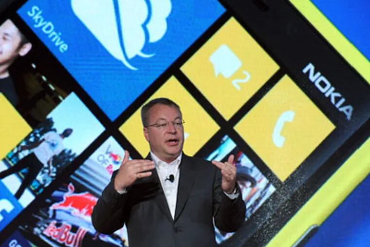 IMAGE DISTRIBUTED FOR NOKIA - Nokia President and CEO Stephen Elop debuts the Nokia Lumia 920, Nokia's flagship Windows Phone 8 smartphone, at a press event in New York, Wednesday, Sept. 5, 2012. The Lumia 920 features a camera able to take in five times more light than competing smartphones for sharp pictures in low light without flash, and the phone comes with integrated wireless charging and a suite of location-based apps for personalized mapping and navigation. (Photo by Diane Bondareff/Invision for Nokia/AP Images)