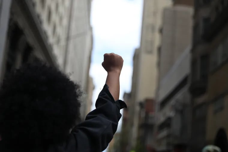 Protesters march throughout Center City in April, denouncing police violence and racism and in solidarity with those who have lost their lives at the hands of police in Philadelphia.