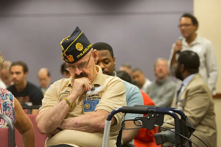 About 50 veterans turned out for the first of two town hall meetings at the Veterans Administration Center in Northeast Philadelphia. ( ED HILLE / Staff Photographer )