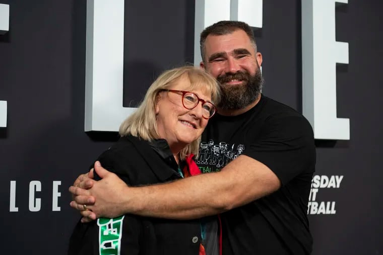 Jason Kelce hugs his mother, Donna, during the premiere of "Kelce" at Suzanne Roberts Theatre. The film is now the most-watched documentary in the U.S. on Amazon Prime Video.
