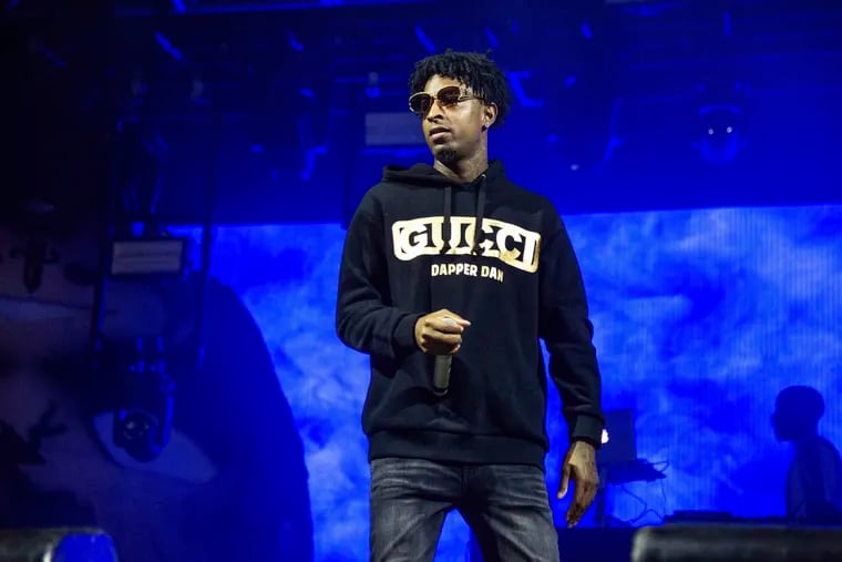 FILE - In this Sunday, Oct. 28, 2018, file photo, 21 Savage performs at the Voodoo Music Experience in City Park in New Orleans. Authorities in Atlanta say Grammy-nominated rapper 21 Savage is in federal immigration custody. U.S. Immigration and Customs Enforcement spokesman Bryan Cox says the artist, whose given name is Sha Yaa Bin Abraham-Joseph, was arrested in a targeted operation early Sunday, Feb. 3, 2019, in the Atlanta area.