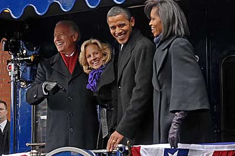 President-elect Barack Obama, his wife Michelle, vice presidential-elect Joe Biden, and his wife Jill, wait for their inaugural train to leave Wilmington. (April Saul / StaffPhotographer)