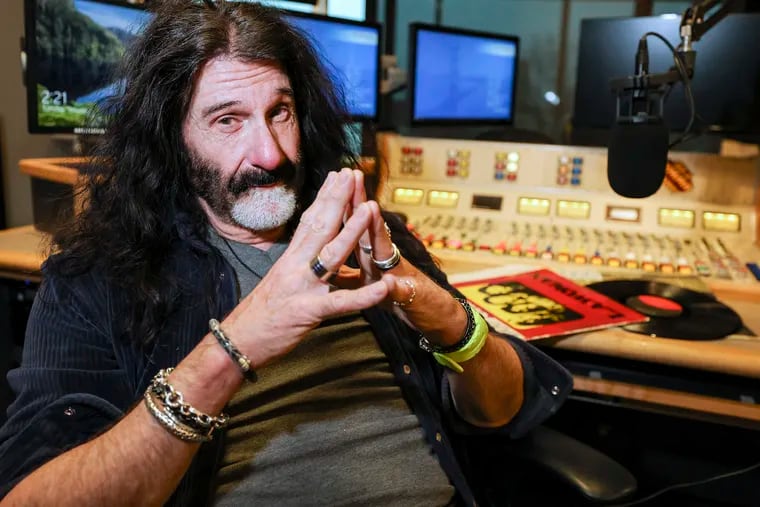 Radio DJ Pierre Robert, 68, at his studio at WMMR in Bala Cynwyd on Tuesday. Robert has just signed a four-year contract extension.