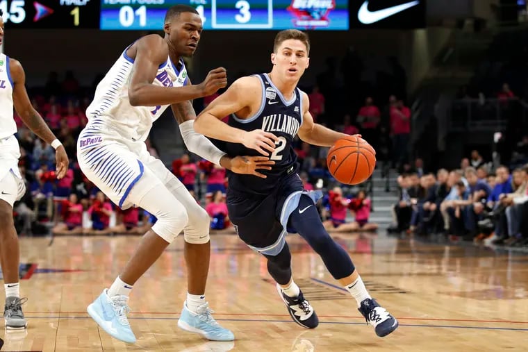 Villanova guard Collin Gillespie gets past DePaul forward Paul Reed during the first half. Gillespie scored 17 points.