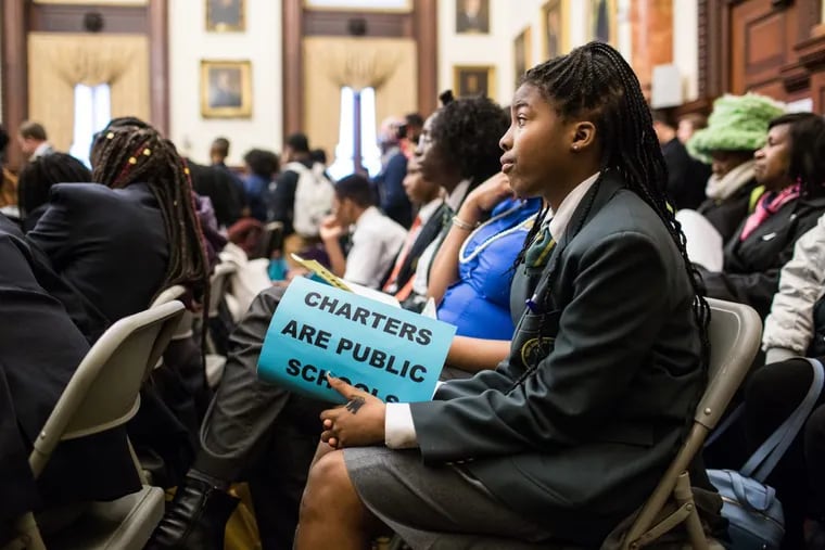 Global Leadership Academy Charter School student Kionna Biuens, 12, was one of hundreds who rallied for charter schools Tuesday. MICHELLE GUSTAFSON