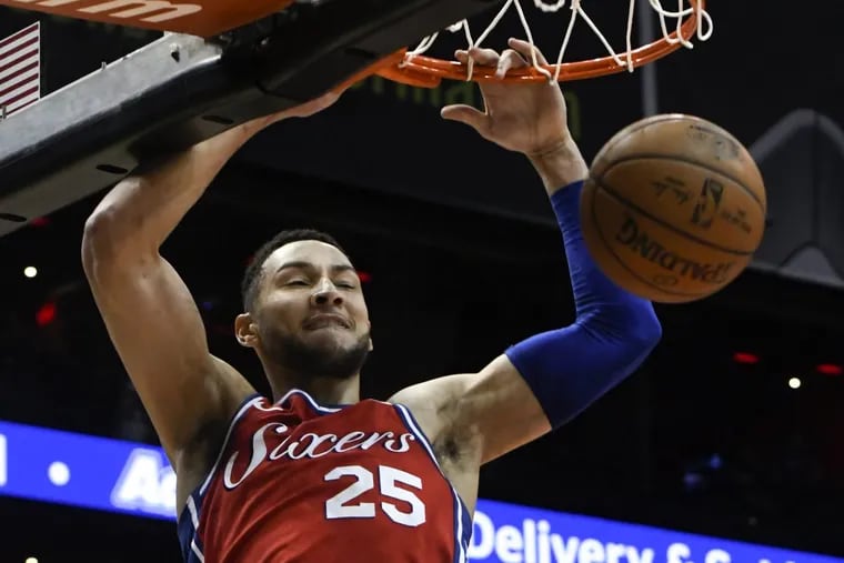 Sixers guard Ben Simmons dunks against the Atlanta Hawks during the second half of an NBA basketball game Friday, March 30, 2018, in Atlanta.